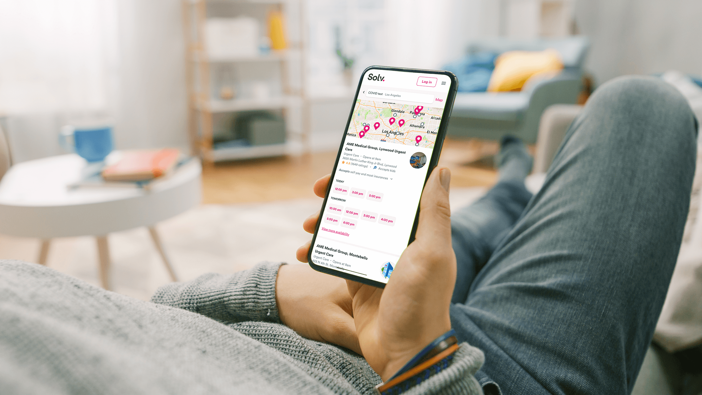 Person booking a covid test through location directory